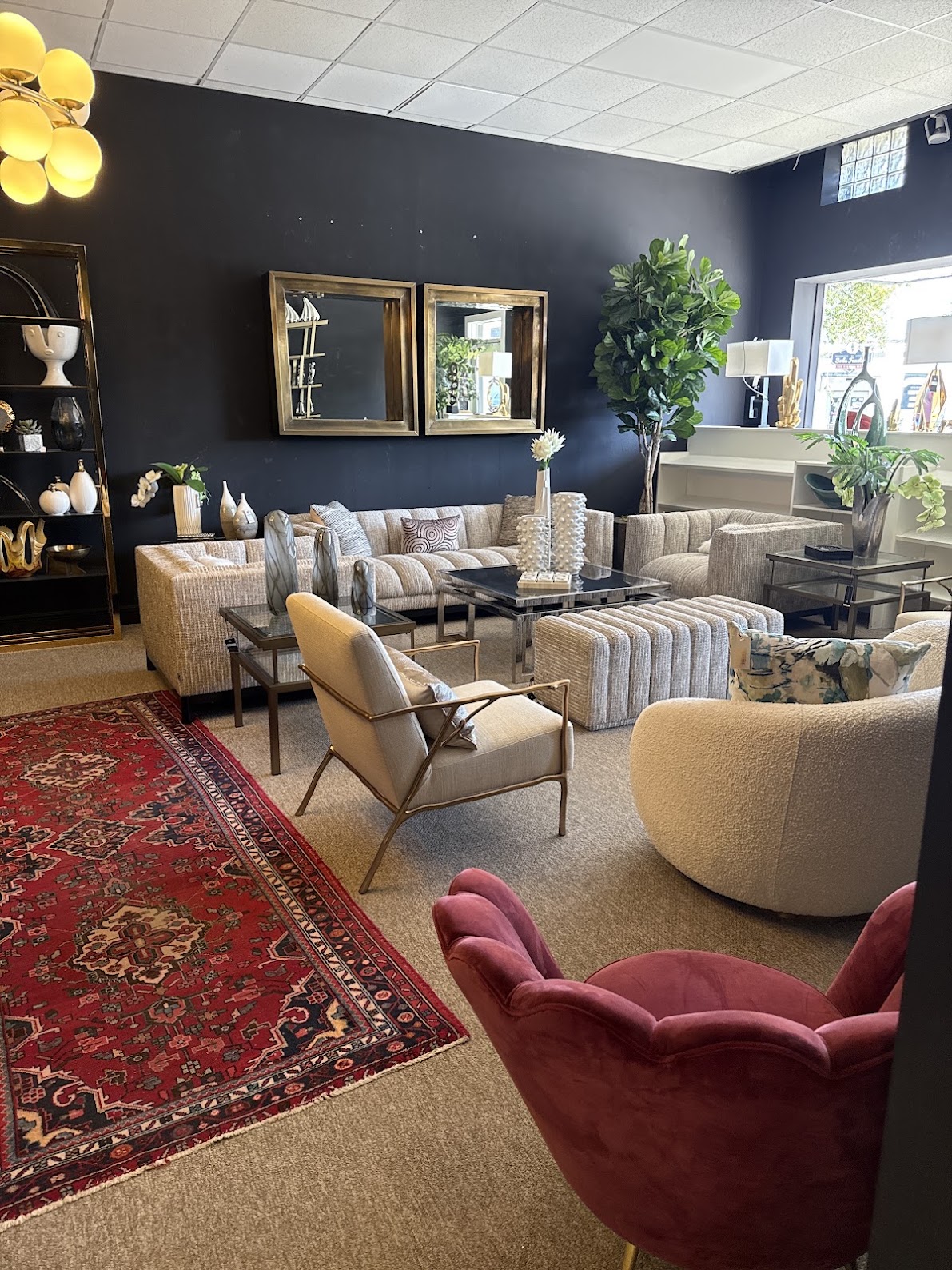 Classic red Persian-style rug shown with modern furniture
